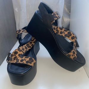 Leopard wedges with elastic straps, size 6.